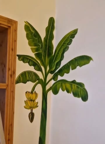Detail of the painted banana tree from the same room